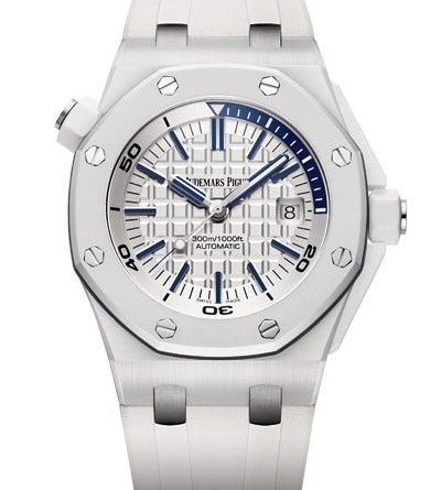 Audemars Piguet Royal Oak Offshore Diver МЕХАНИЗМ Калибр 3120, мануфактурный с автоматическим подзаводом Общий диаметр : 26,60 мм (11 3/4 линии) Высота : 4,26 мм Количество камней : 40 Количество деталей : 280 Резерв хода : 60 часов Частота баланса : 3 Гц (21 600 полуколебаний/час) КОРПУС Из белой керамики Стекло сапфировое с антибликовым покрытием Задняя крышка из титана с сапфировым стеклом с антибликовым покрытием Безель и заводная головка с винтовым стопором из белой керамики Звенья из титана Водонепроницаемость до 300 метров Общий диаметр : 42 мм ЦИФЕРБЛАТ Светло-серебристого цвета с узором Mega Tapisserie Накладные часовые отметки и стрелки Royal Oak из белого золота с люминесцентным покрытием (минутная стрелка синего цвета) Вращающийся внутренний безель светло-серебристого цвета с дайверской шкалой и участком от 60 до 15 минут синего цвета РЕМЕШОК Белый каучуковый ремешок с пряжкой из титана ФУНКЦИИ Измерение продолжительности погружения Часы Минуты Секунды (центральная стрелка) Дата АРТИКУЛ 15707CB.OO.A010CA.01