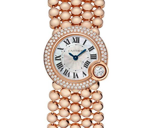 Ballon de Cartier watch Кварцевый механизм Калибр 056 Корпус: 18К розовое золото, диам. 24 мм, перламутровый циферблат/флинке; бриллианты – 0.70 кт, заводная головка – бриллиант, 0.20 кт/стрелки из вороненой стали Стекло: сапфировое Водонепроницаемость: 30мм Браслет: 18К розовое золото
