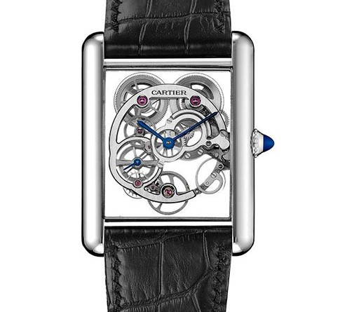 Cartier Tank LC Sapphire Skeleton watch Мануфактурный калибр 9616 MC , ручной завод, скелетон, запас хода – 3 дня Корпус: 18К белое золото, 30 x 39.2 мм, толщина – 7.45 мм, заводная головка – синий сапфир, прозрачная задняя крышка, стрелки из вороненой стали Стекло: сапфировое Водонепроницаемость: 30 м Ремешок: черный , кожа аллигатора/складная застежка из 18К белого золота