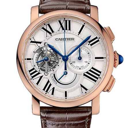 Rotonde de Cartier Tourbillon Chronograph watch with 8-day power reserve Лимитированная серия – 50 экз. Мануфактурный калибр 9438 MC , ручной завод, турбийон, хронограф, запас хода – 8 дней Корпус: 18К розовое золото, диаметр – 45 мм, толщина – 16.4 мм, заводная головка – синий сапфир, прозрачная задняя крышка Циферблат: белый, гальванизированный, гильошированный Стекло: сапфировое Водонепроницаемость: 30 м Ремешок: коричневый , кожа аллигатора/складная застежка из 18К розового золота