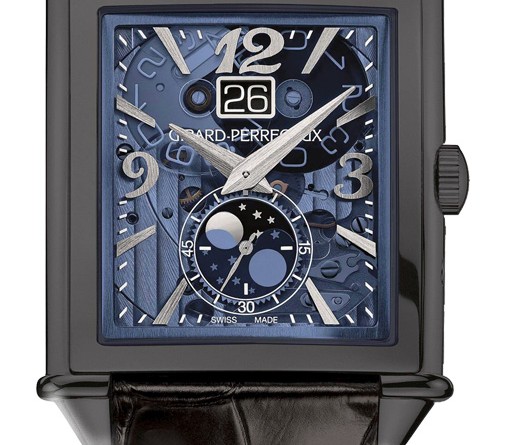 Girard Perregaux Vintage 1945 XXL: титан с черным DLC-покрытием, автоподзавод, мануфактурный калибр GP 03300-0105/0062, запас хода – 46 часов, водонепроницаемость – 30 метров, синий прозрачный поликристаллический циферблат.