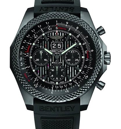 Breitling for Bentley 6.75 Midnight Carbon. Механизм: Breitling Calibre 44B, официально сертифицированный швейцарским институтом хронометрии COSC, с автоподзаводом, высокой частотой (28 800 пк/ час), 38 камней. Точность хронографа - до ¼ секунды, 30-мин. и 12-час. счетчики. Индикатор даты с широкой апертурой. Корпус: черная сталь. Водонепроницаемость до 100 м. Завинчивающаяся заводная головка. Вращающийся зубчатый безель с вариативным счетчиком оборотов (круглая логарифмическая линейка). Выпуклое сапфировое стекло с двусторонним антибликовым покрытием. Диаметр: 49 мм. Циферблат: черный Royal Ebony. Ремешок: каучуковый.